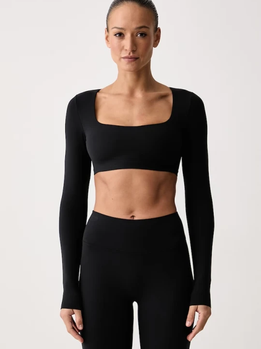 Zdjęcie produktu Nike longsleeve do jogi damski Zenvy czarny