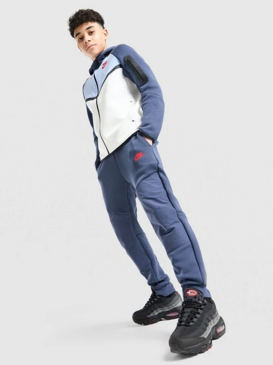 Zdjęcie produktu Nike Spodnie B Nsw Tch Flc Mix Jggr niebieski