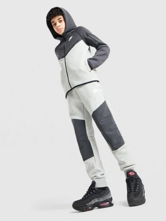 Zdjęcie produktu Nike Spodnie B Nsw Tch Flc Mix Jggr szary