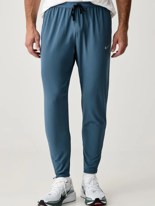 Zdjęcie produktu Nike spodnie dresowe męskie Stride Dri-FIT niebieski
