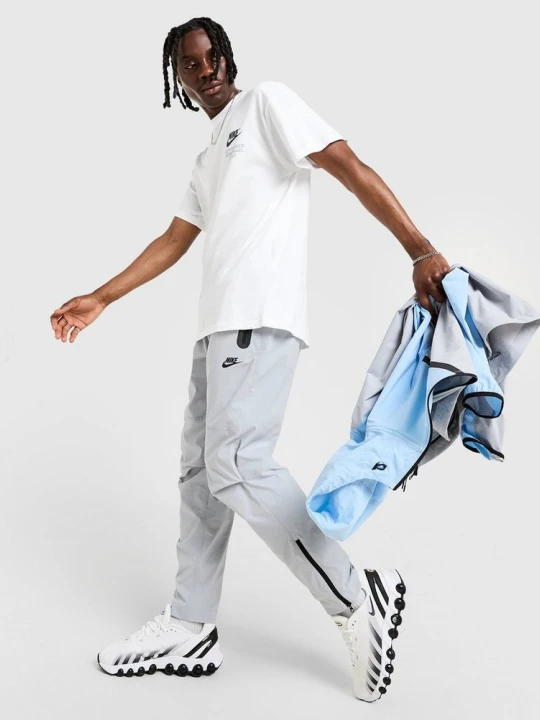Zdjęcie produktu Nike Spodnie Nk Tch Wvn Oh szary