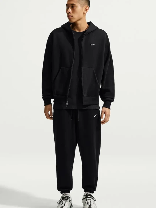 Zdjęcie produktu Nike Sportswear bluza rozpinana z kapturem męska z bawełną Solo Fleece czarny