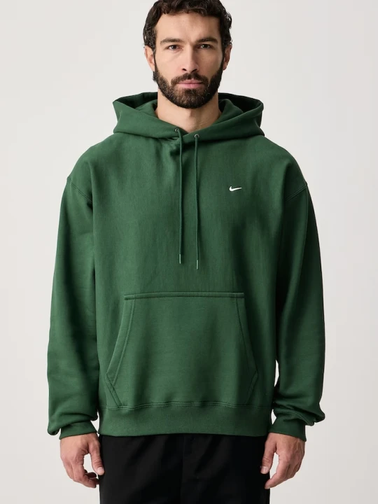 Zdjęcie produktu Nike Sportswear bluza z kapturem męska z bawełną Solo Swoosh zielony
