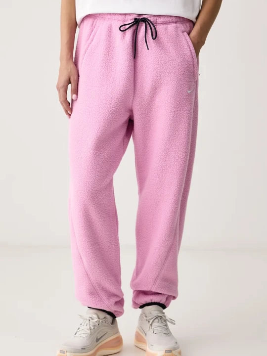 Zdjęcie produktu Nike Sportswear spodnie dresowe damskie polarowe różowy