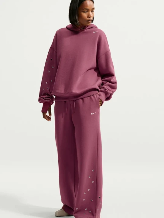Zdjęcie produktu Nike Sportswear spodnie dresowe damskie z bawełną Studio Fleece różowy