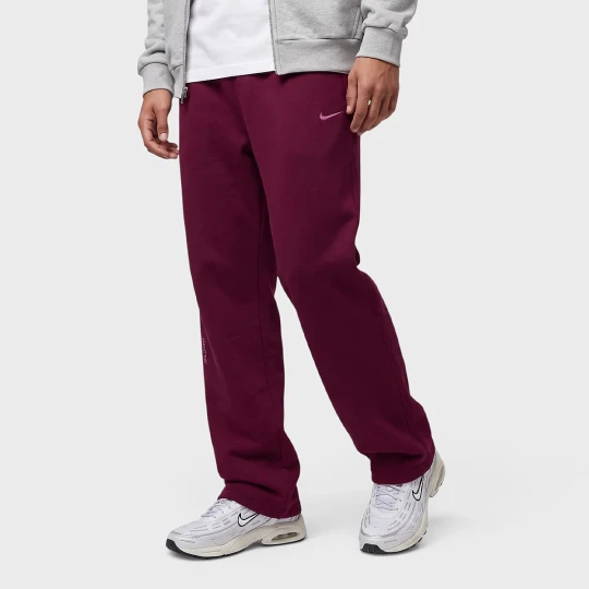 Zdjęcie produktu NRG Nocta CS Open Hem Fleece Pant Nike czerwony