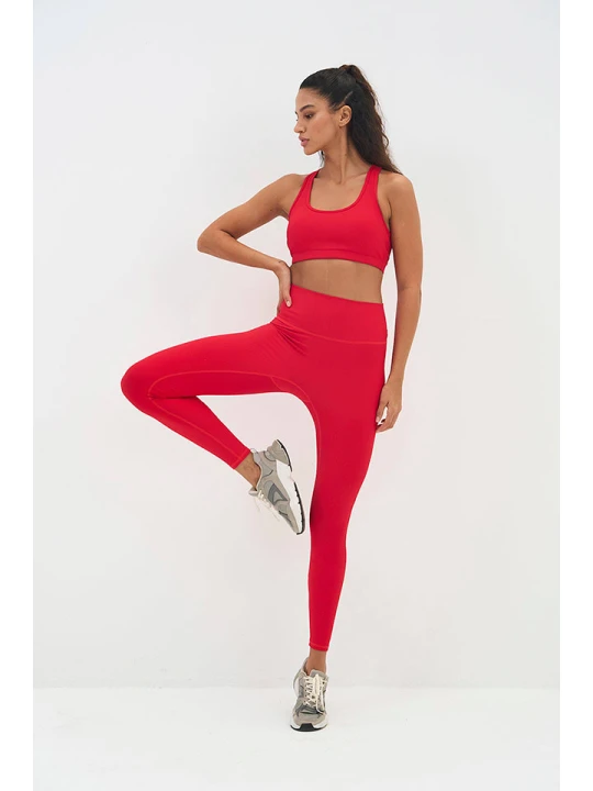 Zdjęcie produktu Onamaste Legginsy sportowe "Lotus" w kolorze czerwonym rozmiar: S/M