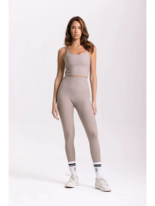 Zdjęcie produktu Onamaste Legginsy sportowe "Lotus" w kolorze szarobrązowym rozmiar: S/M