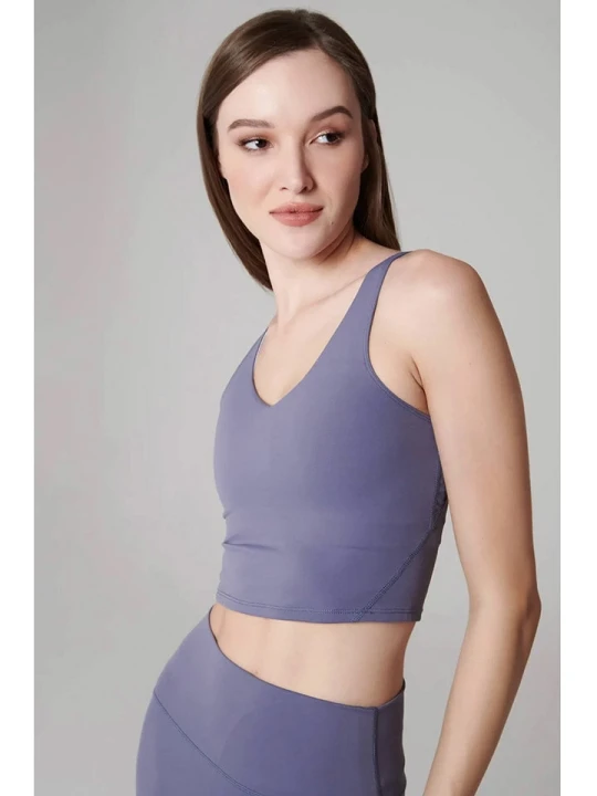 Zdjęcie produktu Onamaste Top sportowy "Mantra" w kolorze fioletowym rozmiar: S/M