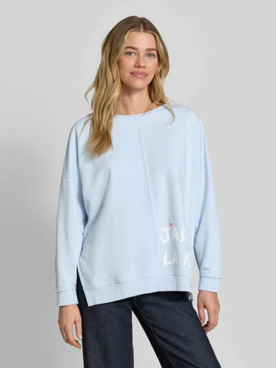 Zdjęcie produktu Oversized bluza z nadrukiem z napisem i zrolowanym brzegiem Smith & Soul Błękitny