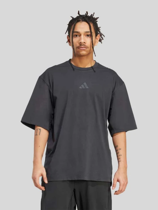Zdjęcie produktu Oversized sportowy t-shirt z mieszanki bawełny z nadrukiem z logo Adidas Czarny