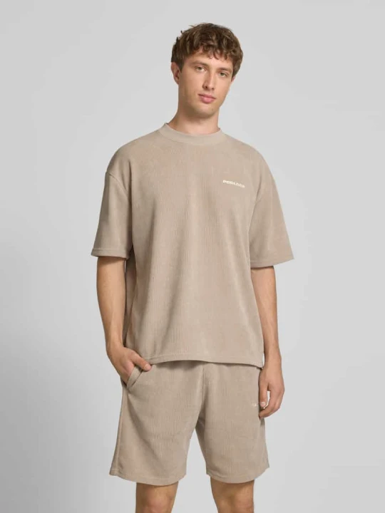 Zdjęcie produktu Oversized t-shirt z wyhaftowanym logo model 'Lagos' Pegador