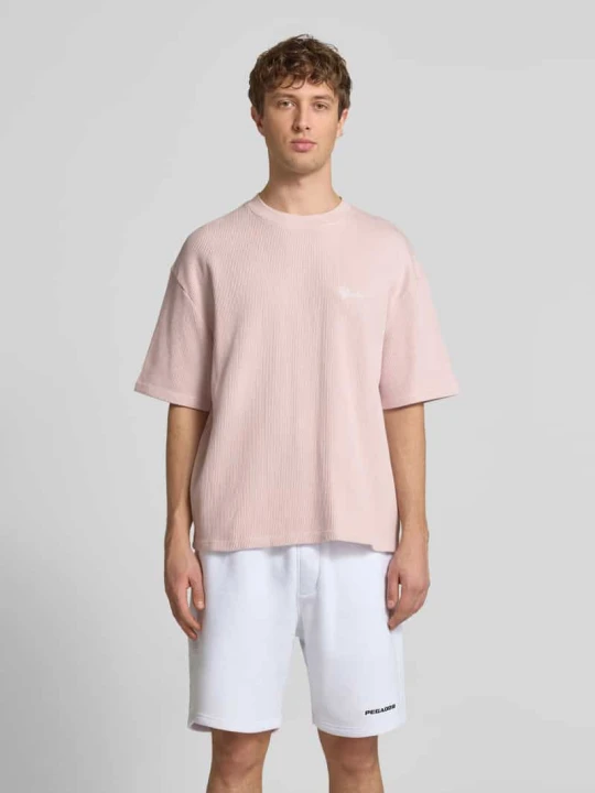 Zdjęcie produktu Oversized T-shirt ze strukturalnym wzorem Pegador Mocnoróżowy