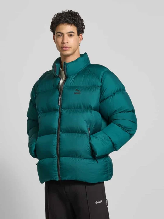 Zdjęcie produktu Pikowana kurtka z kapturem z nadrukiem z logo Puma Ciemnozielony