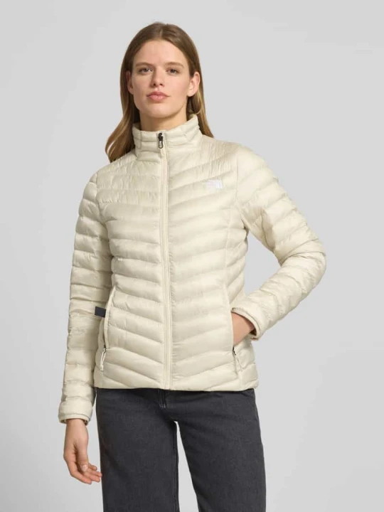 Zdjęcie produktu Pikowana kurtka ze stójką i przeszytym logo The North Face Beżowy
