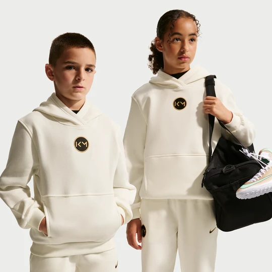 Zdjęcie produktu Piłkarska bluza z kapturem dla dużych dzieci Nike Nike Kylian Mbappé Club Fleece - Biel