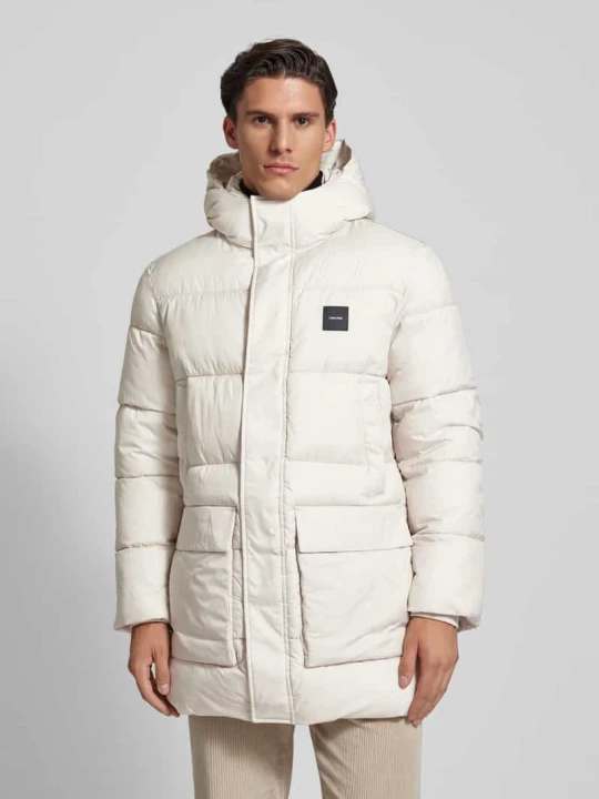 Zdjęcie produktu Płaszcz pikowany z wpuszczanymi kieszeniami Calvin Klein Gliniany