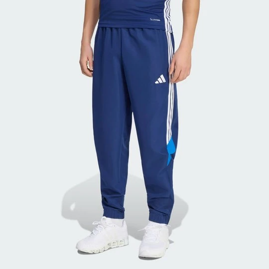 Zdjęcie produktu PLECIONE SPODNIE TIRO 26 ESSENTIALS Adidas niebieski