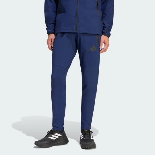Zdjęcie produktu Płócienne spodnie Tiro Travel Adidas