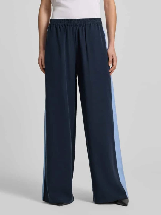 Zdjęcie produktu Lejące spodnie z wiskozy z paski w kontrastowym kolorze - curated by Tinvcb Style Icon Collection