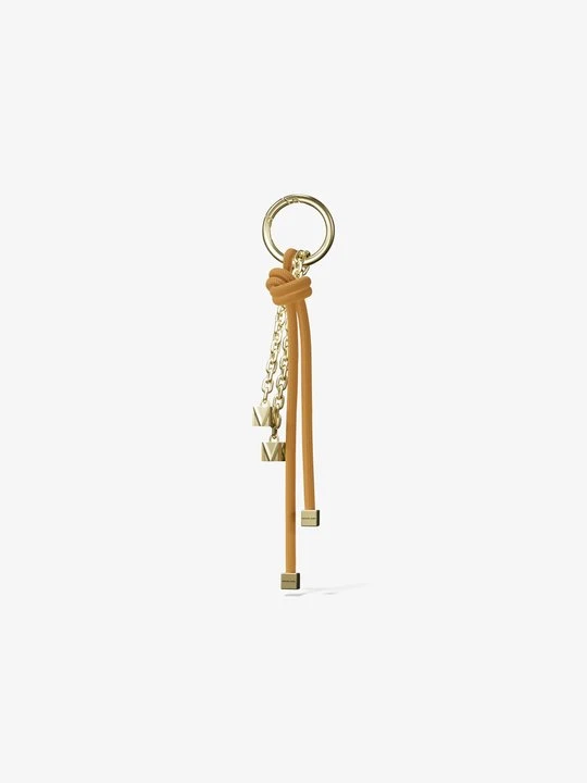 Zdjęcie produktu Pozłacana zawieszka z troczkiem Michael Kors HONEYWHEAT (Żółty)