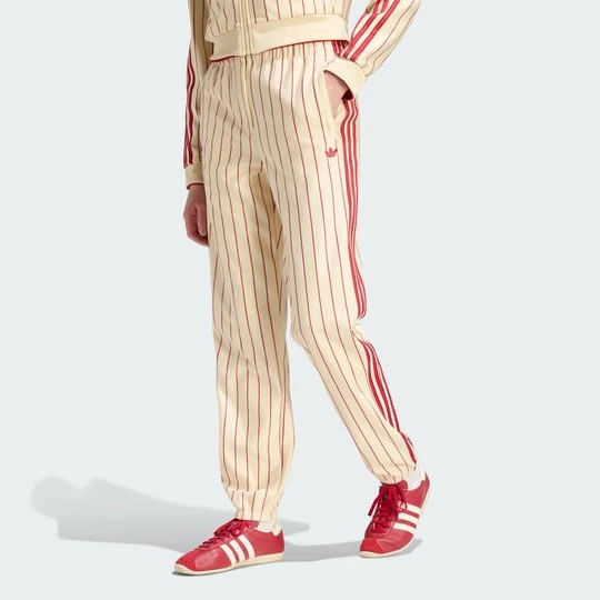 Zdjęcie produktu PRĄŻKOWANE SPODNIE DRESOWE FIREBIRD Adidas żółty