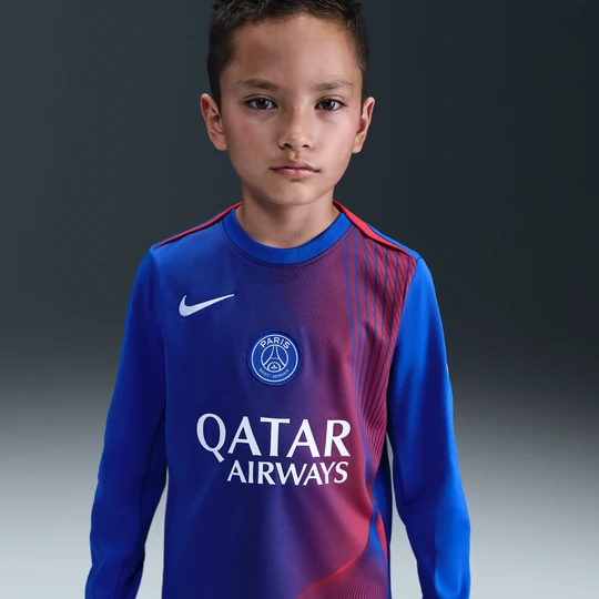 Zdjęcie produktu Przedmeczowa koszulka piłkarska z długim rękawem dla dużych dzieci Nike Dri-FIT Total 90 Paris Saint-Germain Academy Pro (wersja trzecia) - Niebieski