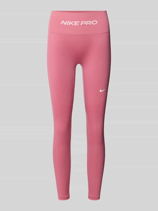 Zdjęcie produktu Przylegające legginsy sportowe z nadruk z logo Nike Mocnoróżowy
