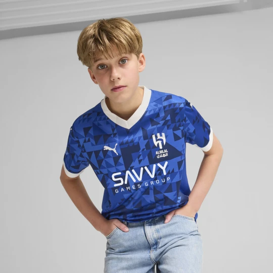 Zdjęcie produktu PUMA Al Hilal Saudi F.C. Młodzieżowa koszulka domowa Stade Rennais F.C. 24/25, Odzież, Niebieski