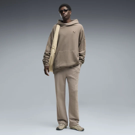 Zdjęcie produktu PUMA Męskie spodnie dresowe o luźnym kroju Essentials, Akcesoria, Beżowy
