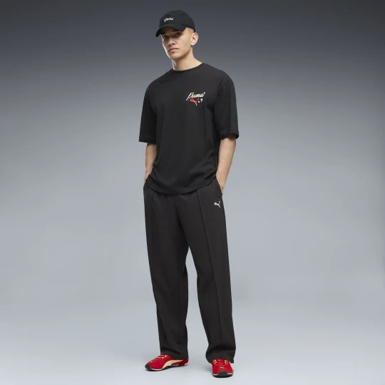 Zdjęcie produktu PUMA MÄ™skie spodnie Essentials 4-Way Stretch Stacked o swobodnym kroju, OdzieÅ¼, Czarny