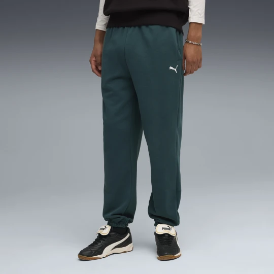 Zdjęcie produktu PUMA Męskie spodnie dresowe o luźnym kroju Wardrobe Essentials, Odzież, Zielony
