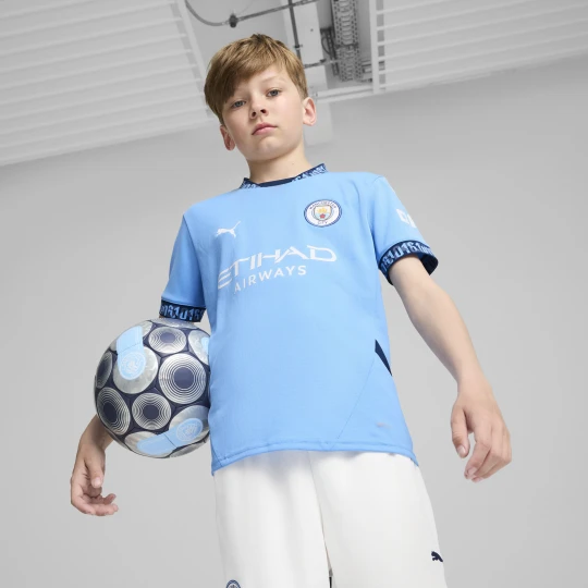 Zdjęcie produktu PUMA MÅ‚odzieÅ¼owa koszulka domowa Manchester City 24/25, OdzieÅ¼, Niebieski