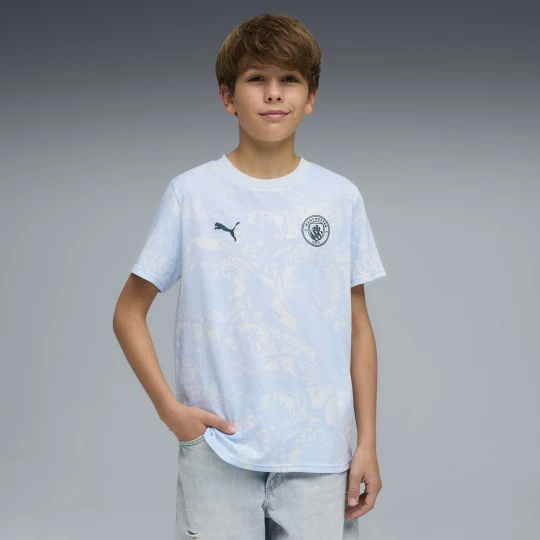 Zdjęcie produktu PUMA Młodzieżowa koszulka Manchester City FtblCulture z nadrukiem na całej powierzchni, Odzież, Niebieski
