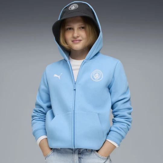 Zdjęcie produktu PUMA MÅ‚odzieÅ¼owa kurtka Manchester City FtblEssentials z kapturem, OdzieÅ¼, Niebieski