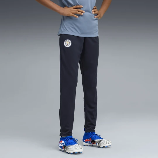 Zdjęcie produktu PUMA Młodzieżowe spodnie treningowe Manchester City, Odzież, Niebieski Deep Navy