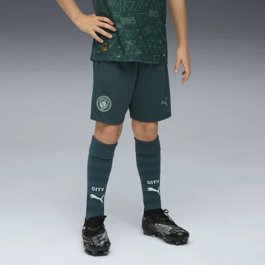 Zdjęcie produktu PUMA MÅ‚odzieÅ¼owe szorty Manchester City 25 / 26, OdzieÅ¼, Zielony