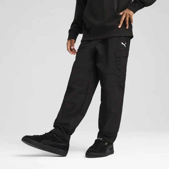Zdjęcie produktu PUMA MÅ‚odzieÅ¼owe tkane bojÃ³wki WARDROBE ESS o luÅºnym kroju, OdzieÅ¼, Czarny