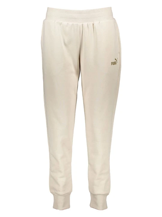 Zdjęcie produktu Puma Spodnie dresowe "Essentials+" w kolorze beżowym rozmiar: XL