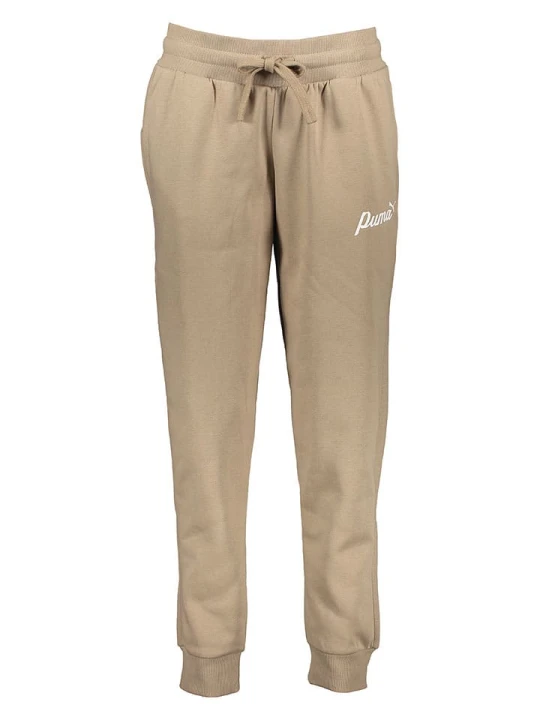 Zdjęcie produktu Puma Spodnie dresowe "Essentials+" w kolorze beżowym rozmiar: M