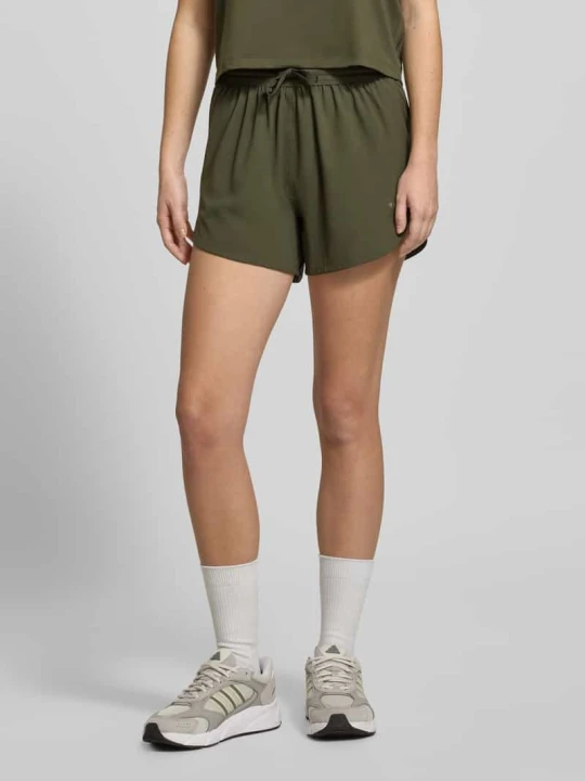 Zdjęcie produktu PUMA x HYROX - Szorty z nadrukiem z logo Oliwkowy