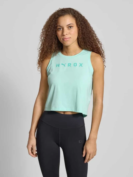 Zdjęcie produktu PUMA x HYROX - Top o krótkim kroju z nadrukiem z logo Miętowy