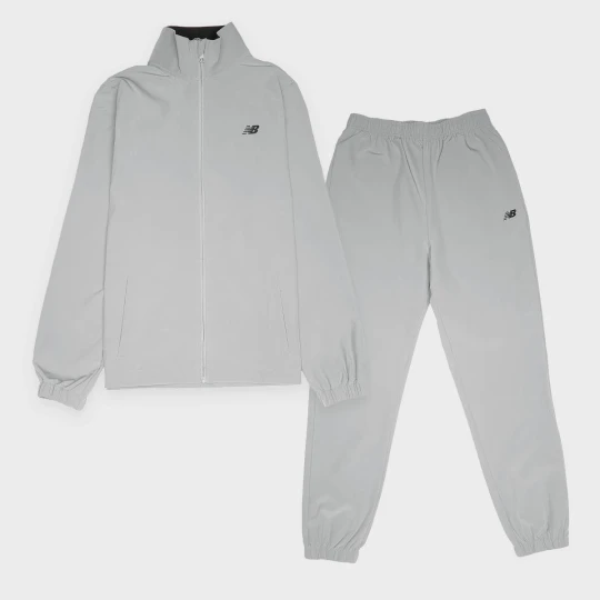 Zdjęcie produktu Quarter Zip Funnel & Jogger Set New Balance szary