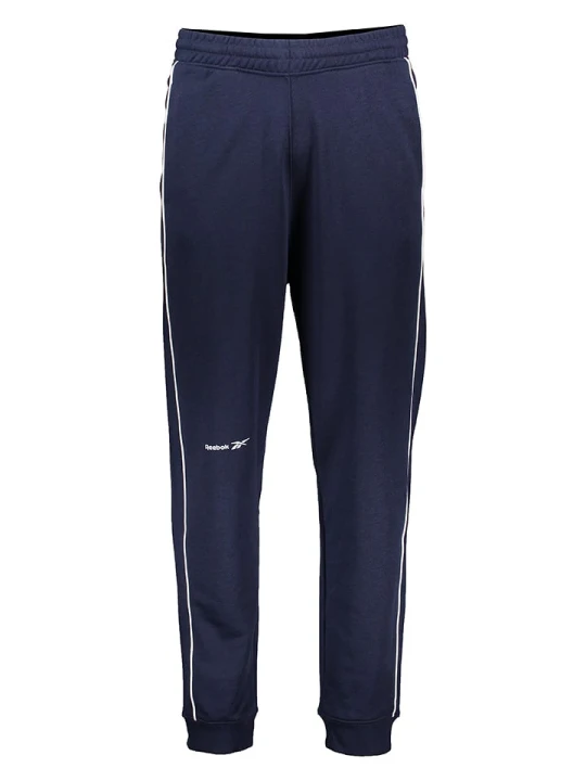 Zdjęcie produktu Reebok Spodnie dresowe w kolorze granatowym rozmiar: S