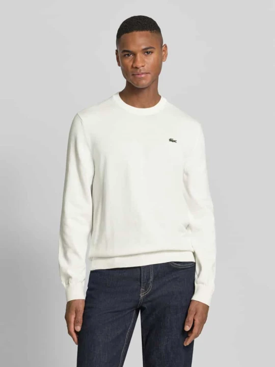 Zdjęcie produktu Regular Fit sweter z dzianiny z mieszanki bawełny Lacoste Złamany biały