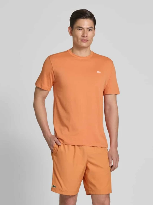Zdjęcie produktu Regular Fit T-shirt z mieszanki bawełny Lacoste Pomarańczowy