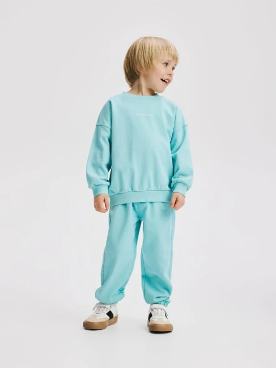 Zdjęcie produktu Reserved - Bawełniane spodnie jogger - miętowy