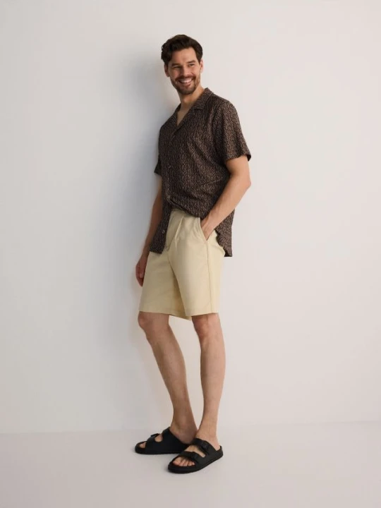 Zdjęcie produktu Reserved - Gładkie szorty loose fit - beżowy