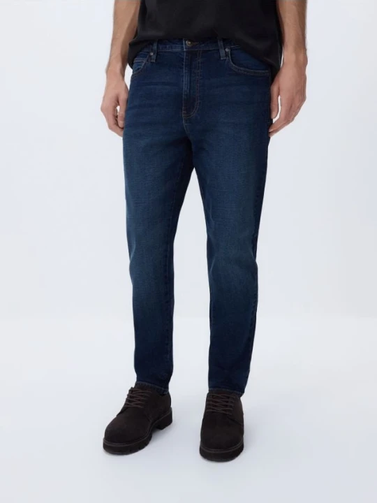 Zdjęcie produktu Reserved - Jeansy carrot slim z efektem sprania - granatowy