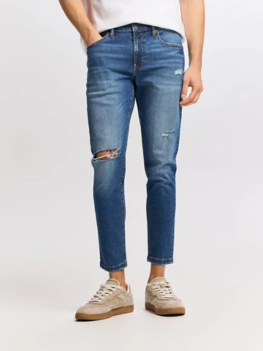 Zdjęcie produktu Reserved - Jeansy skinny z przetarciami - niebieski